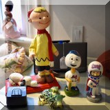 Y12. Bobbleheads, Charlie Brown sculpture and toys. 
